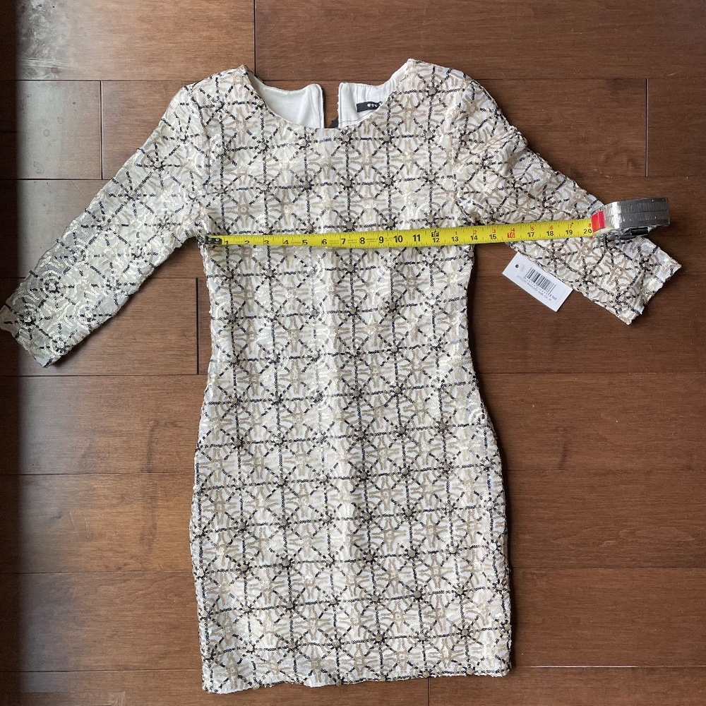 NWT. Geometric Sequin 3/4 sleeve Party Dress Cream Gold and Black TFNC Size M